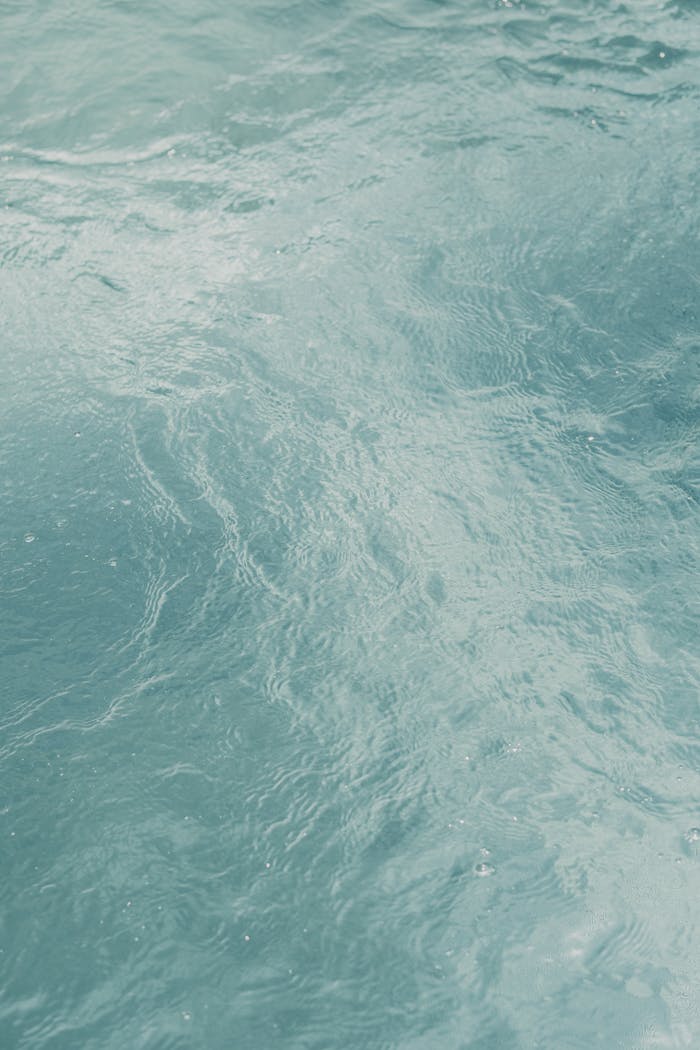 heros-img A serene close-up of clear water with gentle ripples creating a calming effect.